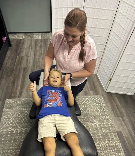 Dr. Sarah Cook during a session with a child
